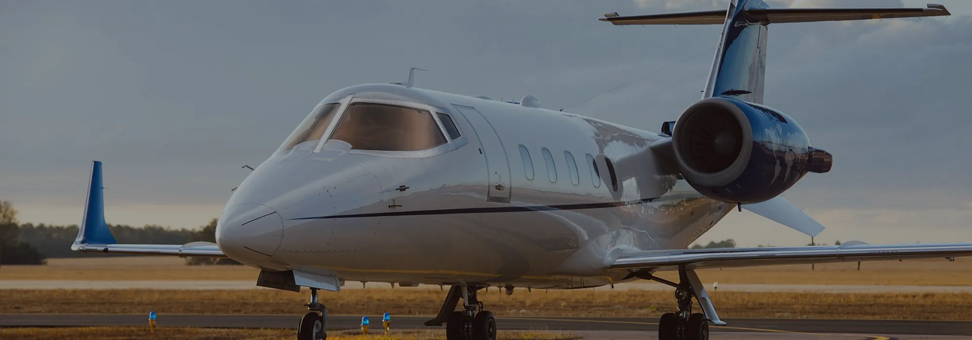 A Jet ICU Learjet on the ramp at dusk, door shut, nose and engine close. (their own photograph)